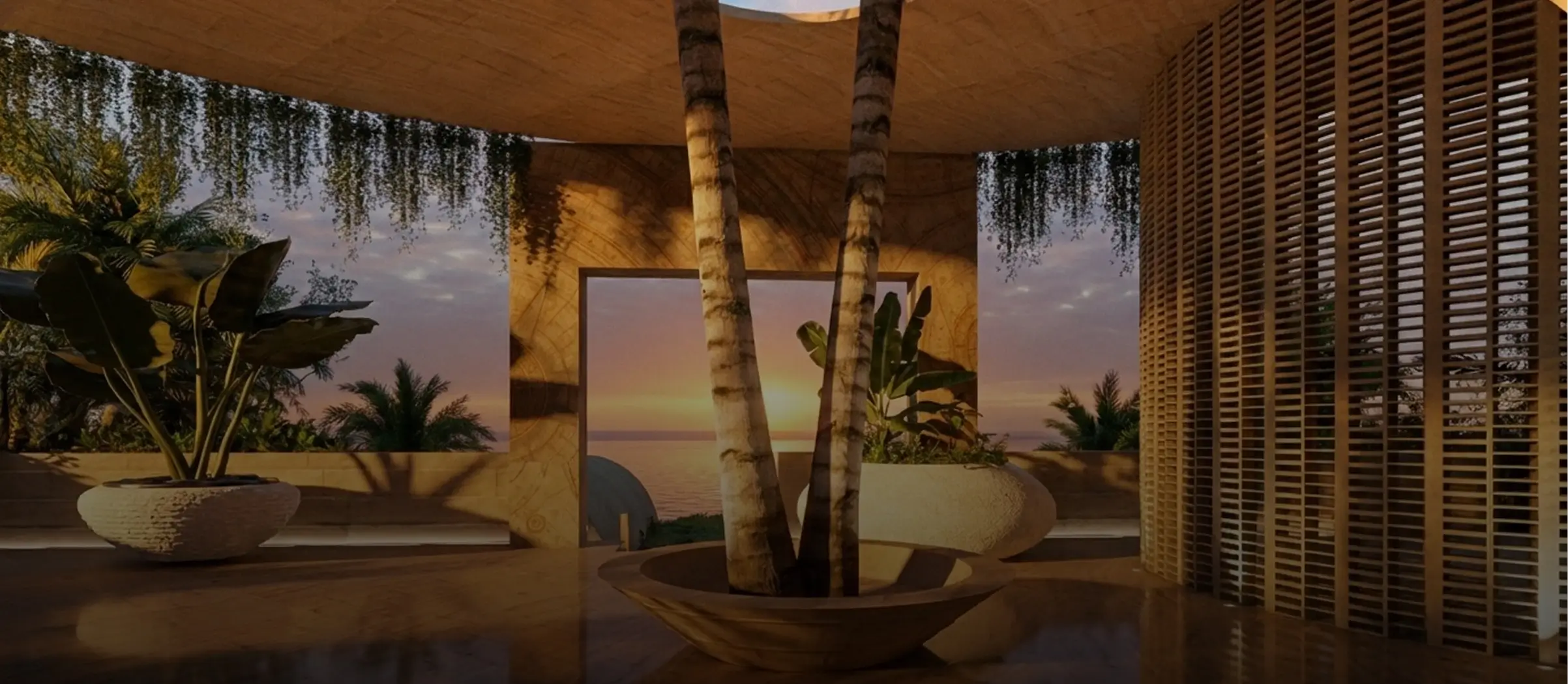 Terraza abierta con vista al mar al atardecer, vegetación tropical y diseño arquitectónico con elementos naturales.
